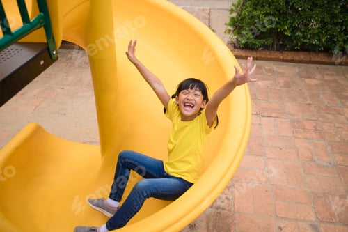 Preview: Active little girl on playground