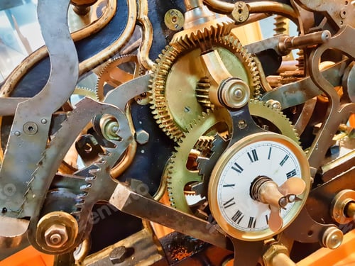 Preview: Closeup shot of machinery and cogwheels of an old clocks mechanism