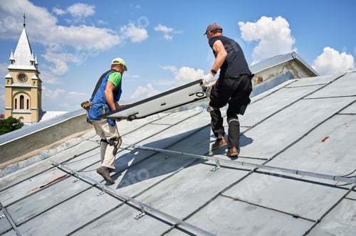 Preview: Workers building solar panel system on roof of house. Installers carrying photovoltaic solar module