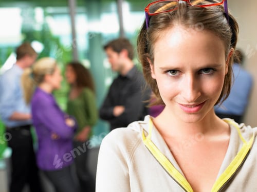 Preview: Business woman in the office, smiling