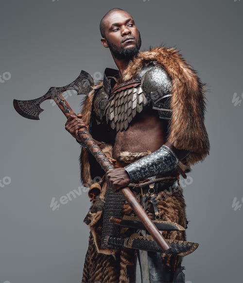 Preview: Proud warrior from the past in fur and armour holding a combat axe