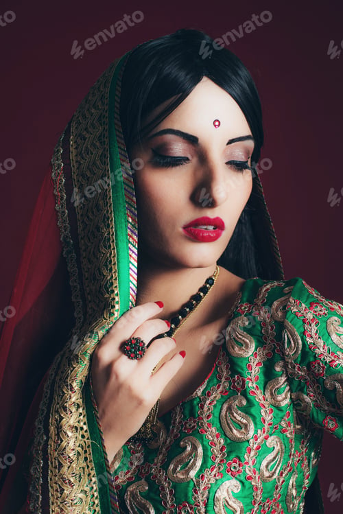 Preview: Vintage Bollywood Fashion Girl Against Dark Red Background.