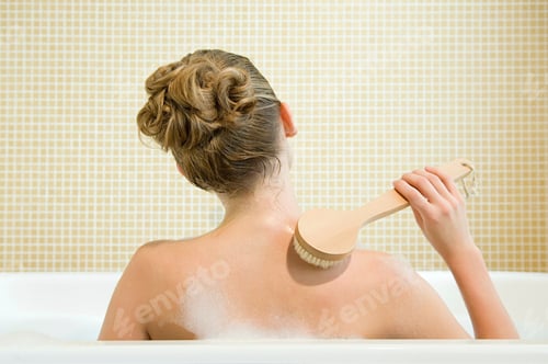 Preview: Indulging in a relaxing bubble bath with a soothing back scrub