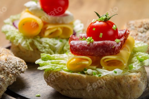 Preview: Closeup of sandwich with tomato cocktail, cheese and lettuce