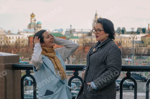 Preview: Two Women Enjoying Time Together in Urban Setting