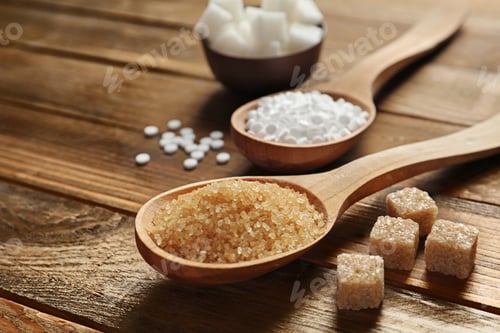 Preview: Different types of sugar on wooden table