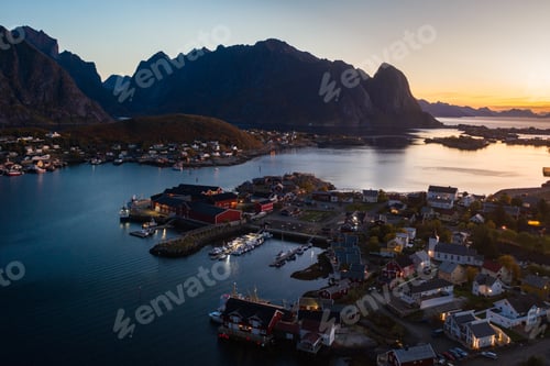 Preview: Breathtaking shot of the mountainous landscape with the ocean captured in Reine, Norway