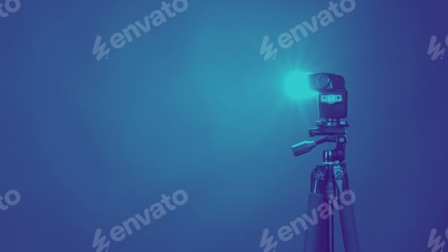 Preview: Flash light on tripod in studio production set up for professional photographer shooting photo or fi