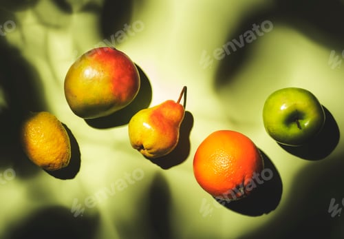 Preview: Summer fruits top view. Contemporary still life, lime green background