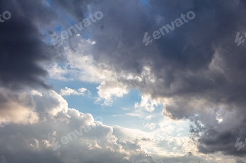 Preview: Cloud on blue sky background. Cloudscape grey and orange shade. Twilight light color the cloudy sky
