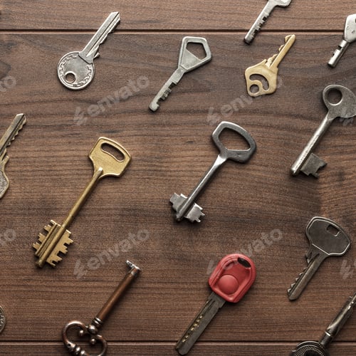 Preview: Many Different Keys On Wooden Table