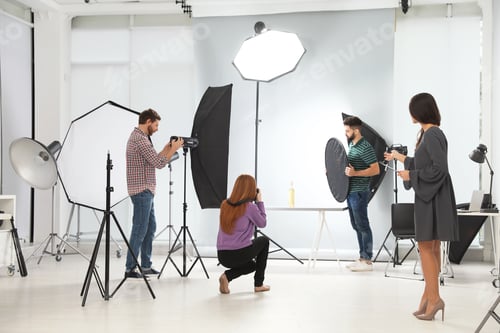 Preview: Photo studio with professional equipment and team of workers
