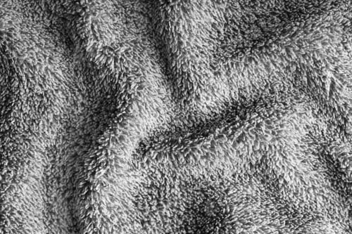Preview: Crumpled Fluffy Gray Terry Towel Microfiber Fabric Texture With Wrinkles And Waves Background