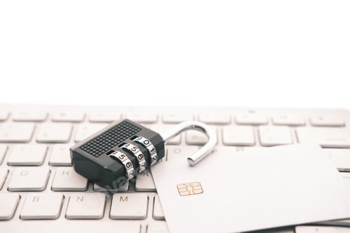 Preview: internet safety concept with padlocked and credit card on computer keyboard