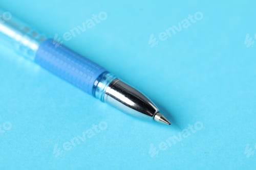 Preview: One ballpoint pen on light blue background, macro view. Space for text