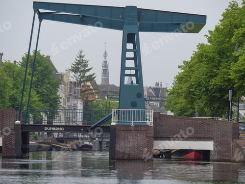 Preview: Stunning view of the iconic canal bridge in Leiden, Netherland