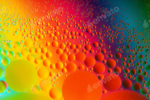 Preview: Multicolored background from abstract oil drops on the water surface.Looks like molecules structure.