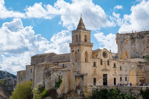 Preview: Explore the ancient charm of Matera's stunning architecture under a vibrant sky