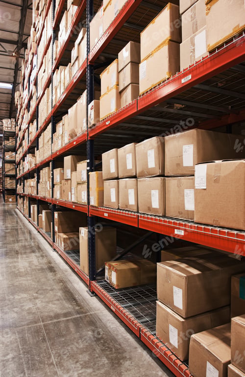 Preview: Cardboard boxes on shelves in warehouse