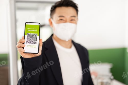 Preview: Man show phone with app of Coronavirus Vaccination