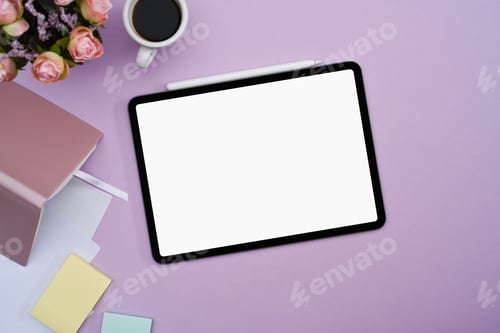 Preview: Digital tablet with white screen, notebook, coffee cup and sticky notes on purple background.