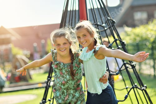 Preview: Joyful children having fun on playground