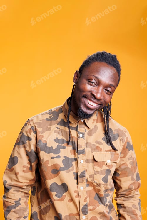 Preview: Cheerful man laughting at camera