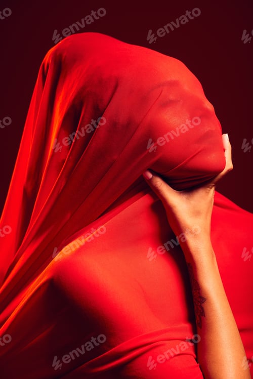 Preview: Model, red fabric and hide face for fashion, aesthetic and beauty with dark studio background. Gen