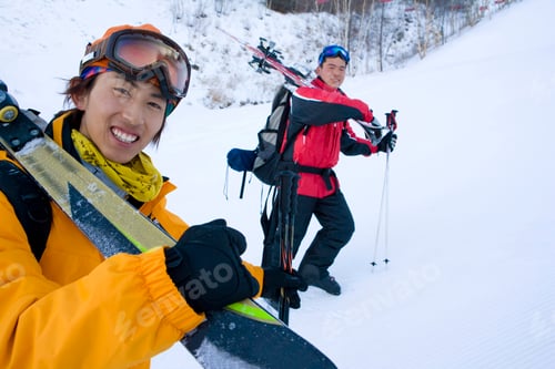 Preview: Two young men hiking and smiling at the camera