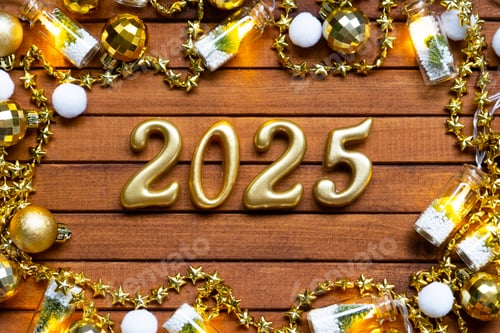 Preview: Happy New Year wooden numbers 2025 on cozy festive brown wooden background with sequins, snow, light