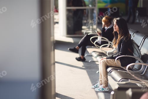 Preview: Teenage girl waiting at airport lounge