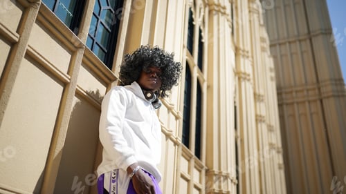 Preview: Young smiling attractive black man lifestyle portrait.