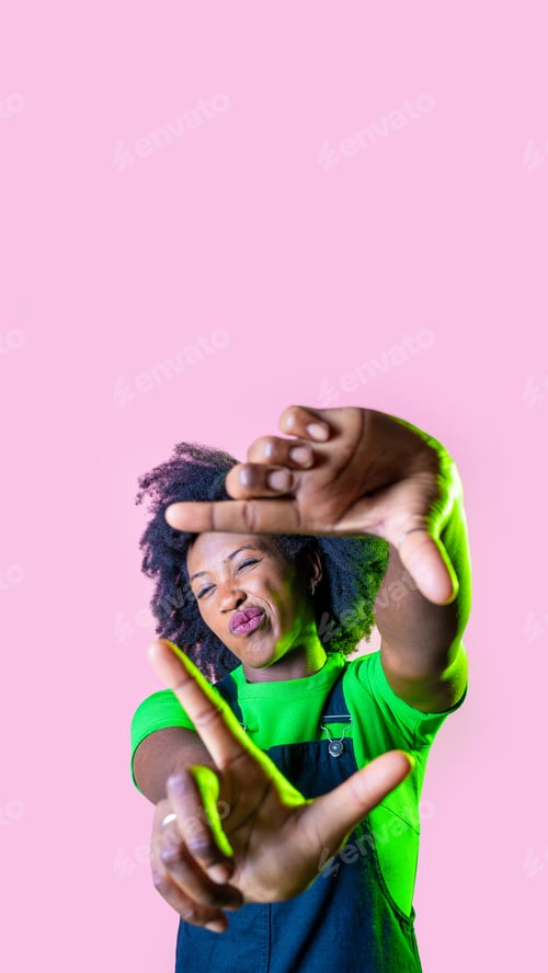 Preview: Young black woman making frame fingers isolated background smiling having fun advertising copyspace