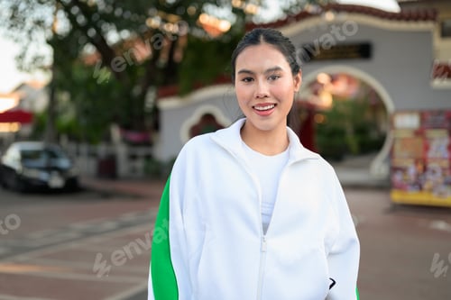 Preview: Young Asian Woman in Sporty Casual Outfit Outdoors