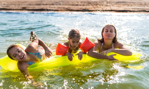 Preview: Happy mother and two small positive daughters