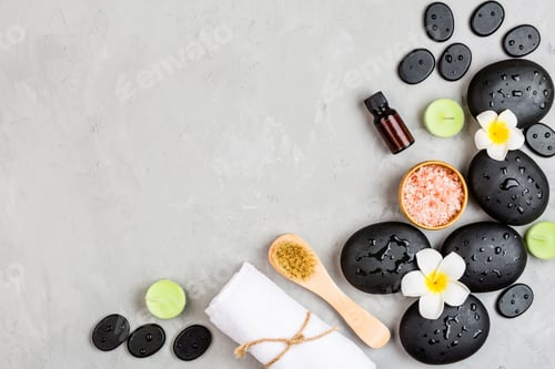 Preview: Flat lay of hot spa stones for massage treatment. Top view overhead , copy space