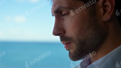 Preview: Tired man face rubbing eyes at sea view office closeup. Lawyer feeling headache