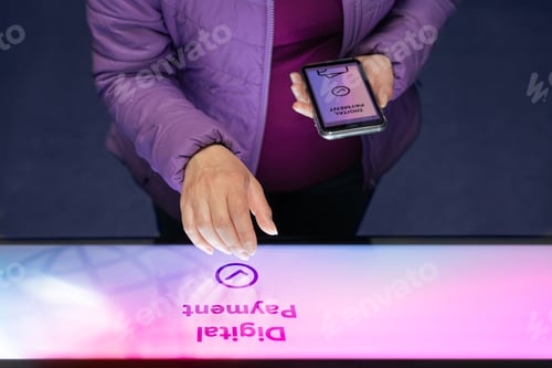 Preview: Woman purchasing a product using electronic payments. Digital payment from e-wallet