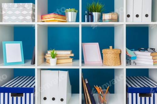 Preview: Stacks of supplies and paperwork in the office and bookshelves