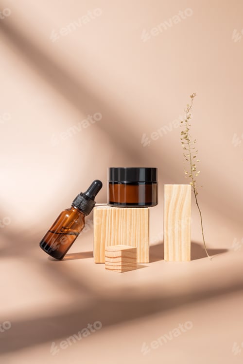 Preview: Set of cosmetic products in amber glass package. Beauty oil in droppper glass bottle and amber glass