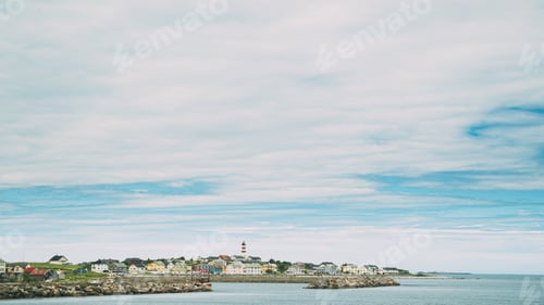 Preview: Alnesgard, Godoya, Norway. Old Alnes Lighthouse In Summer Day In Godoy Island Near Alesund Town