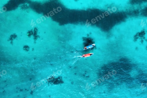Preview: Aerial view of the fishing boats in transparent blue water