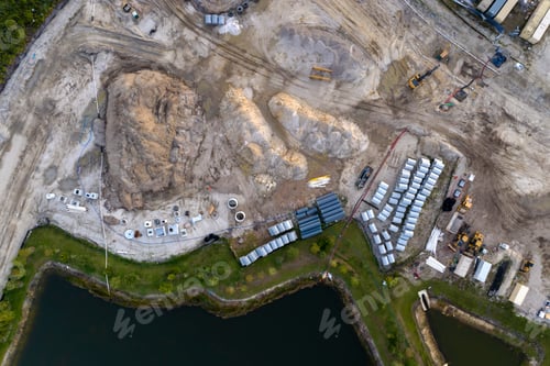 Preview: Construction site with building equipment on prepared ground in american suburbs.