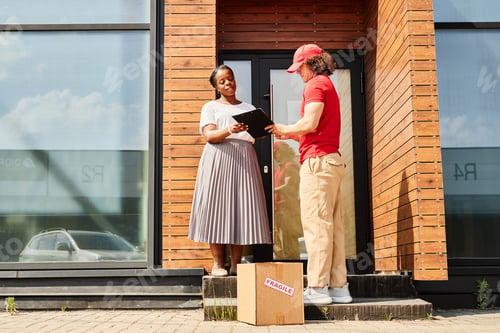 Preview: Delivery Professional Handing Package to Customer