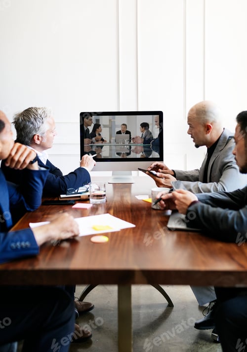 Preview: Business people in a meeting