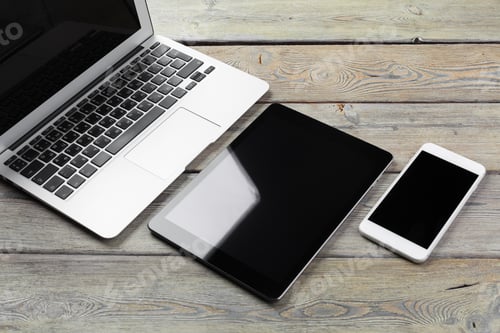 Preview: Open laptop with digital tablet and smartphone close up