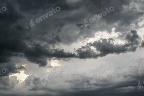 Preview: Dark dramatic sky with black storm clouds.