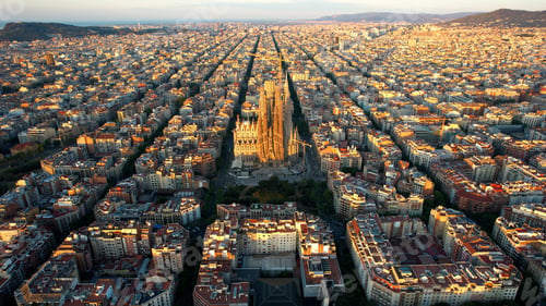 Preview: Aerial view of Barcelona city skyline and Sagrada Familia Cathedral. Eixample residential urban grid