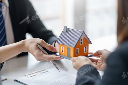 Preview: Real estate agent to buy house and land are delivering house to customer after agreeing to make a ho