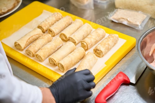 Preview: Cook prepares pancakes with meat filling
